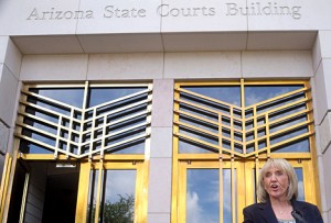 Gov. Jan Brewer chose the steps of the Arizona Supreme Court Building June 16 after filing a special action seeking to force the Legislature to send her the budget bills. (Photo by Bill Coates)