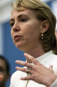 In this July 28, 2010 file photo, Rep. Gabrielle Giffords, D-Ariz., speaks during a news conference on Capitol Hill, in Washington. Republican Jesse Kelly was still basking in the glow of his victory in an Arizona congressional primary last week when the Democratic congresswoman he's trying to unseat released a scathing TV ad branding him "a risk" who would gamble away people's retirement savings. (AP Photo/Drew Angerer)