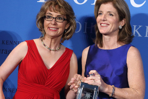 Caroline Kennedy, right, poses with former Arizona congresswoman Gabrielle Giffords after presenting her with the John F. Kennedy Profile in Courage Award at the JFK Library in Boston, Sunday, May 5, 2013. (AP Photo/Michael Dwyer)