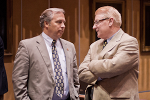 Republican Sens. Adam Driggs (left) and Bob Worsley huddle in conversation after the final vote to pass Gov. Jan Brewer's Medicaid expansion plan (Photo by Evan Wyloge/Arizona Capitol Times)