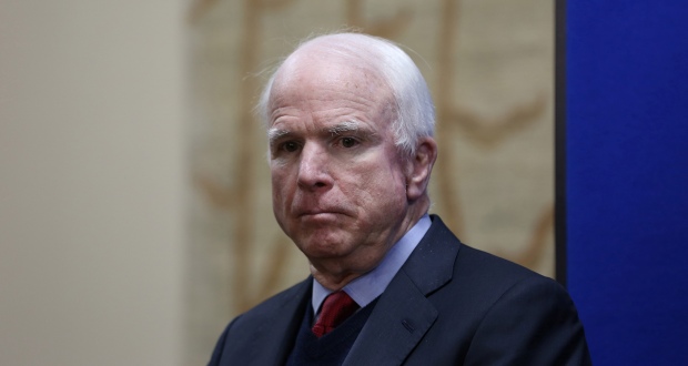 U.S. senator John McCain looks on during a press conference at the U.S. Embassy in Kabul, Afghanistan, Thursday, Jan. 2, 2014. McCain and several other U.S. senators said they've warned the Afghan President Hamid Karzai that a failure to sign a key Afghan-U.S. security deal would pose a threat to the country and the region. (AP Photo/Massoud Hossaini)