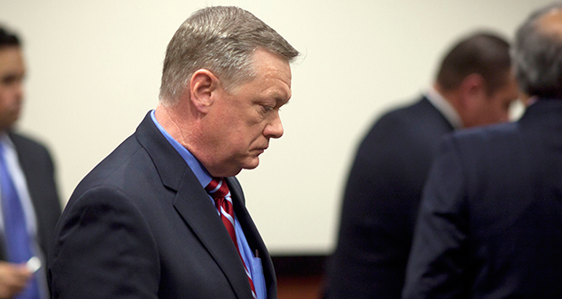 In this Feb. 21, 2013, file photo, Former Fiesta Bowl CEO John Junker appears in Maricopa County Superior Court in Phoenix, Ariz. Junker, who acknowledged participating in an illegal campaign contribution scheme, faces sentencing Thursday, March 13, 2014, in federal court. Junker pleaded guilty two years ago to a federal conspiracy charge after being accused of being involved in the scheme in which Fiesta Bowl employees made illegal campaign contributions to politicians and were reimbursed by the nonprofit bowl. (AP Photo/The Arizona Republic, Mark Henle, File)