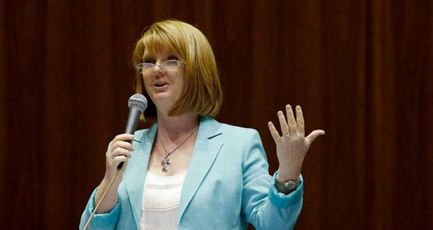 Rep. Heather Carter, R-Cave Creek, debates an amendment to House Bill 2291, an expansion for Arizona's school-voucher program, before members vote on the measure at the Arizona Capitol on Thursday, April 17, 2014, in Phoenix. Key Republicans, including Carter, joined Democrats to vote down House Bill 2291, which would have made another 100,000 to 120,000 low-income students eligible for the Arizona Empowerment Scholarship Accounts program. (Photo by Ross D. Franklin, AP)