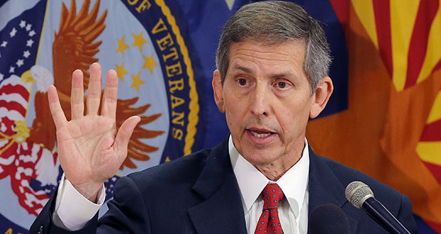 Acting Secretary of Veterans Affairs Sloan Gibson speaks, Thursday, June 5, 2014, in Phoenix. It was Acting Secretary Gibson's first visit to Phoenix since taking over the agency amid an investigation that found 1,700 veterans were kept off the official waiting list for care at the troubled Arizona hospital. (AP Photo/Matt York)