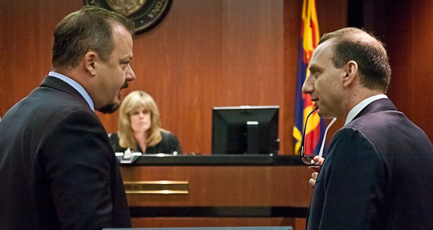 Timothy LaSota, the attorney representing Arizona Attorney General Tom Horne, and Joe Kanefield, the attorney representing the Arizona Citizens' Clean Election Commission, talk during a July 11 hearing. (Photo by Evan Wyloge/Arizona Capitol Times)