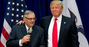 In this Jan. 26, 2016, photo, Republican presidential candidate Donald Trump is joined by Maricopa County, Ariz., Sheriff Joe Arpaio at a campaign event in Marshalltown, Iowa. (AP Photo/Mary Altaffer, File)