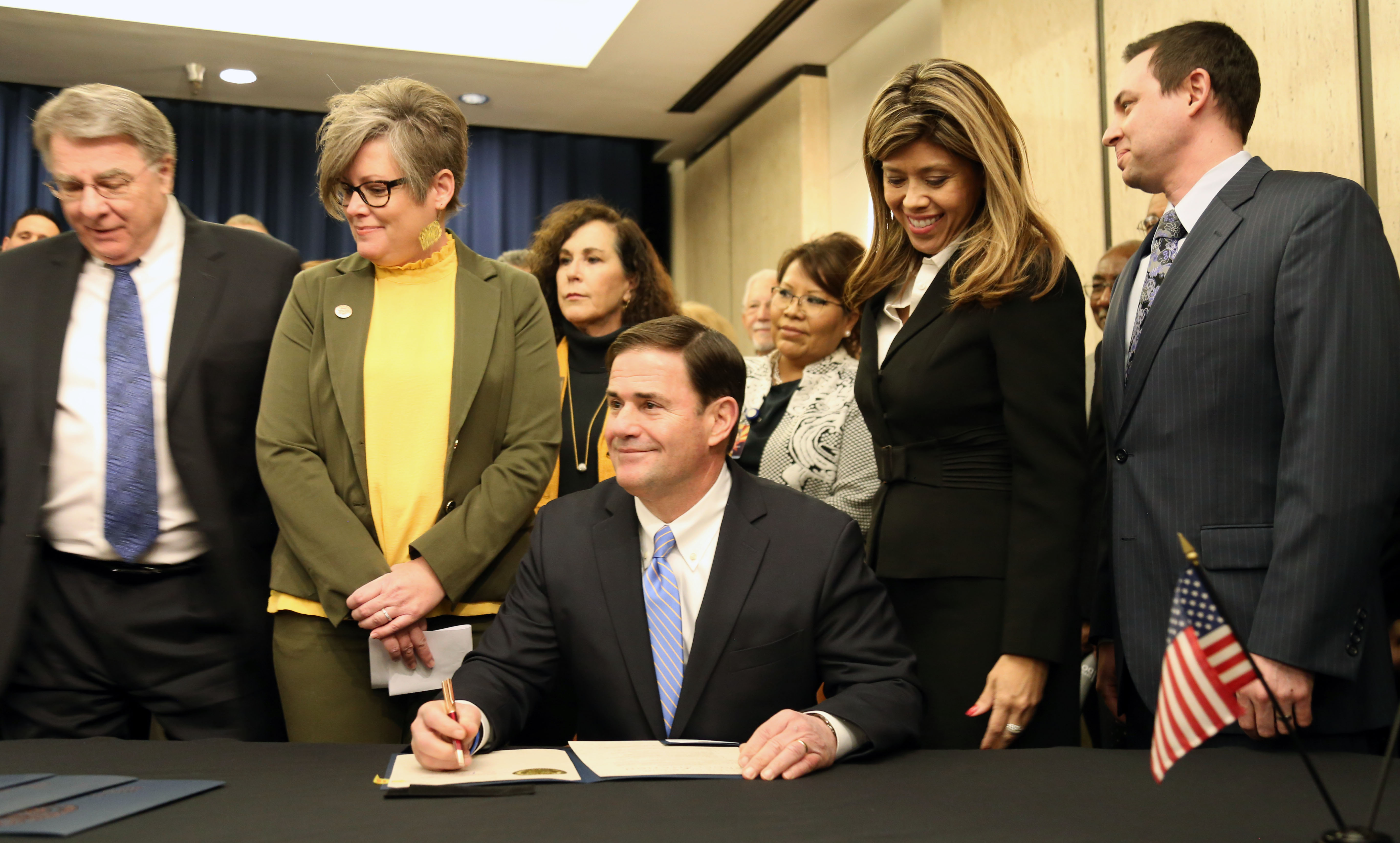 Gov. Doug Ducey convenes a special session on the opioid crisis on Jan. 22. (From left) Senate President Steve Yarbrough, Senate Minority Leader Katie Hobbs, House Minority Leader Rebecca Rios, House Speaker J.D. Mesnard and a litany of other lawmakers and supporters joined the governor to advocate for various changes in law related to opioids. (Photo by Katie Campbell/Arizona Capitol Times)