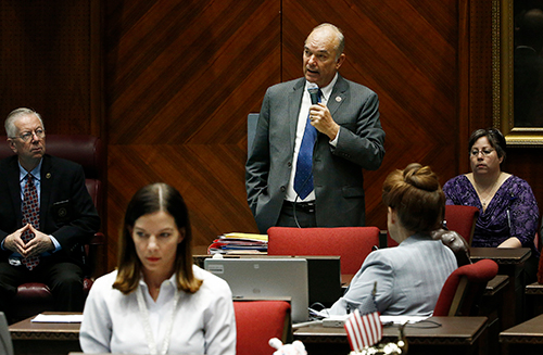 Rep. Michelle Ugenti, R-Scottsdale, listens to Rep. Don Shooter, R-Yuma, read a statement regarding sexual harassment and other misconduct complaints made against him by Ugenti-Rita and others. Shooters comments came during mandatory sexual harassment and ethics training Jan. 9 on the House floor of the capitol.