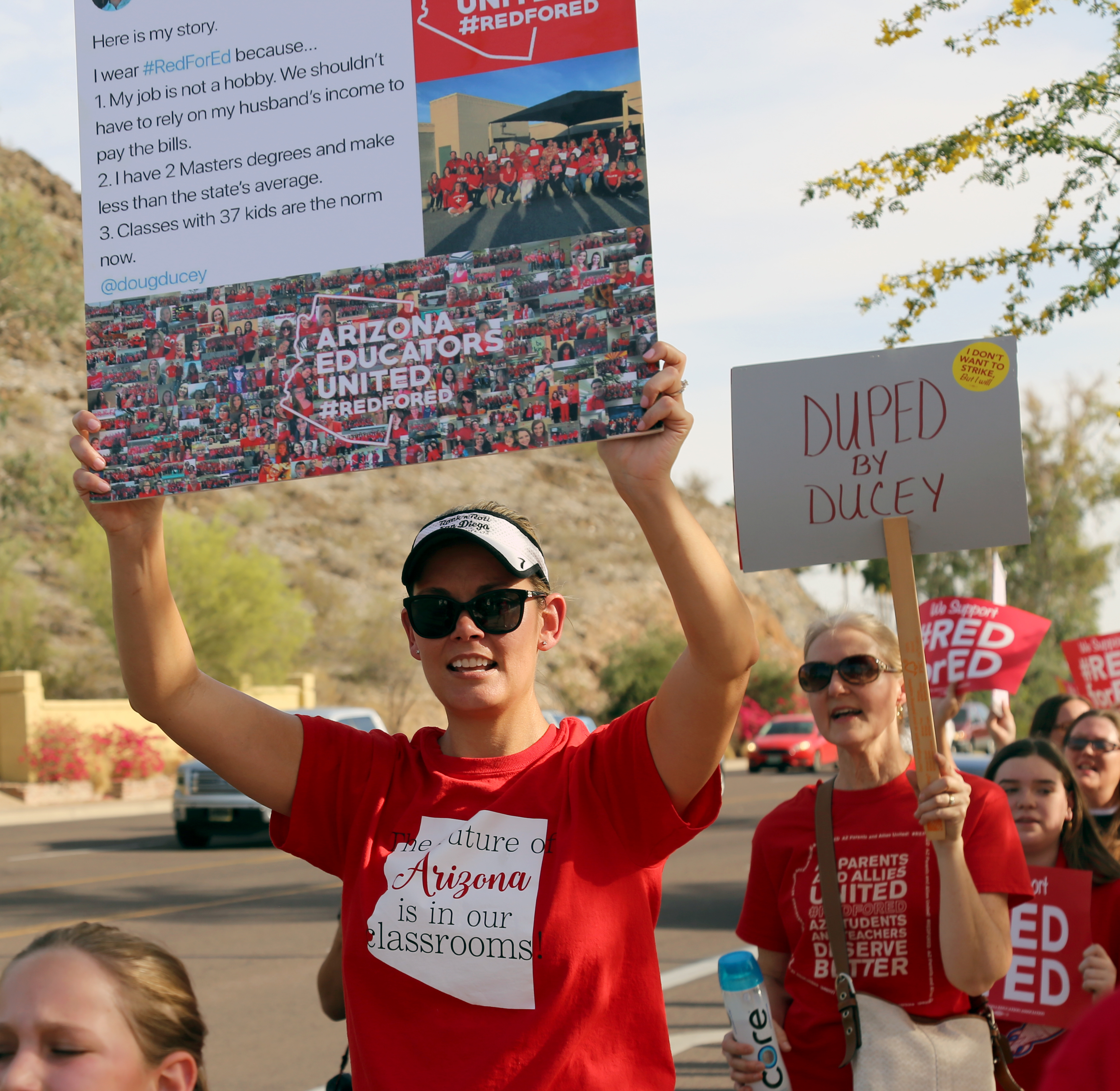 Jennifer Samuels marches with dozens of her peers, students and other supporters of the Arizona Educators United movement on April 10. (Photo by Katie Campbell/Arizona Capitol Times)