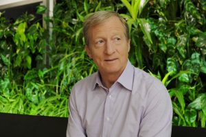 In this photo taken Wednesday, June 27, 2018, environmental activist & billionaire Tom Steyer poses at his offices in San Francisco. Arizona’s largest utility is fiercely opposing a push to mandate increased use of renewable energy in the sun-drenched state, setting up a political fight over the measure funded by Steyer. (AP Photo/Eric Risberg)