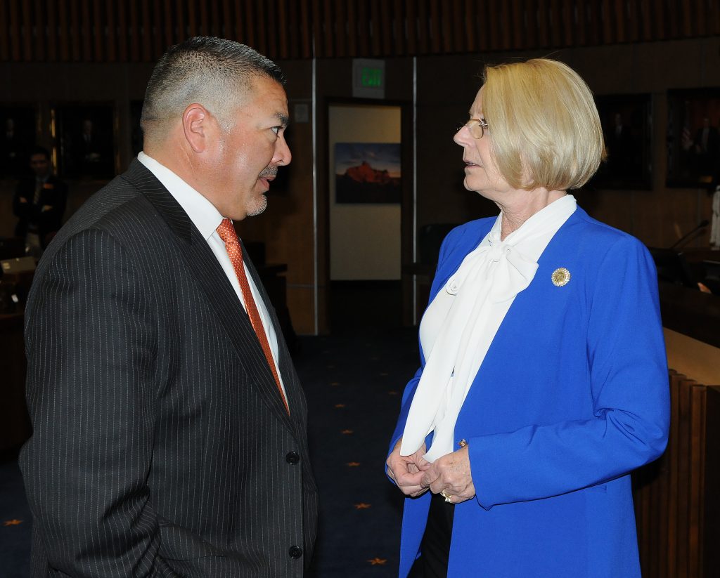 Senate Minority Whip Lupe Contreras confers Monday with Senate President Karen Fann as lawmakers determine what needs to be done immediately to deal with the COVID-19 outbreak. (Capitol Media Services photo by Howard Fischer)