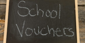 school vouchers written on a chalkboard