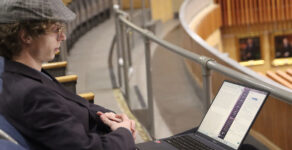 Reporter Martin Dreyfuss works on stories for Cronkite News at the Arizona Capitol in Phoenix on Feb. 28, 2024. Dreyfuss is assigned to cover the Arizona Legislature for the immersive newsroom program this semester and expects to earn a bachelor's degree in journalism and mass communication in December 2024 from Arizona State University's Walter Cronkite School of Journalism and Mass Communication. (Photo by Lauren Kobley/Cronkite News)