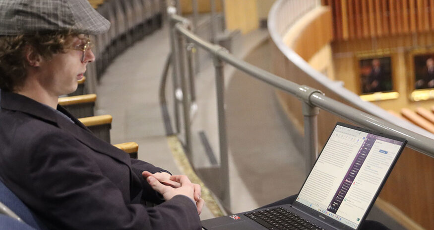 Reporter Martin Dreyfuss works on stories for Cronkite News at the Arizona Capitol in Phoenix on Feb. 28, 2024. Dreyfuss is assigned to cover the Arizona Legislature for the immersive newsroom program this semester and expects to earn a bachelor's degree in journalism and mass communication in December 2024 from Arizona State University's Walter Cronkite School of Journalism and Mass Communication. (Photo by Lauren Kobley/Cronkite News)