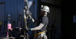 A woker checks on a piece of mining equipment at the Energy Fuels Inc. uranium Pinyon Plain Mine Wednesday, Jan. 31, 2024, near Tusayan, Ariz. The largest uranium producer in the United States is ramping up work just south of Grand Canyon National Park on a long-contested project that largely has sat dormant since the 1980s.