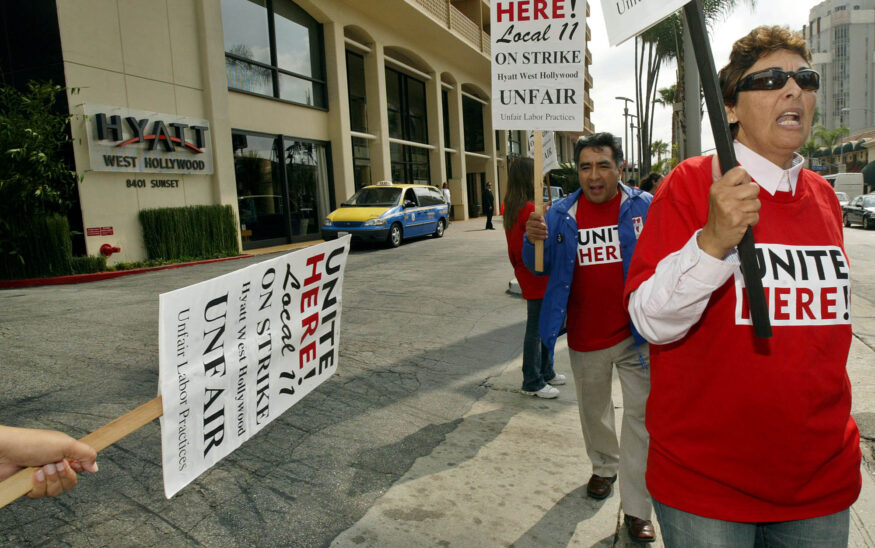 Bellmen, desk workers and other employees at the Hyatt hotel picket outside with Unite Here Local 11 after walking out early Thursday, June 9, 2005, in West Hollywood, Calif. (AP Photo/Ric Francis)